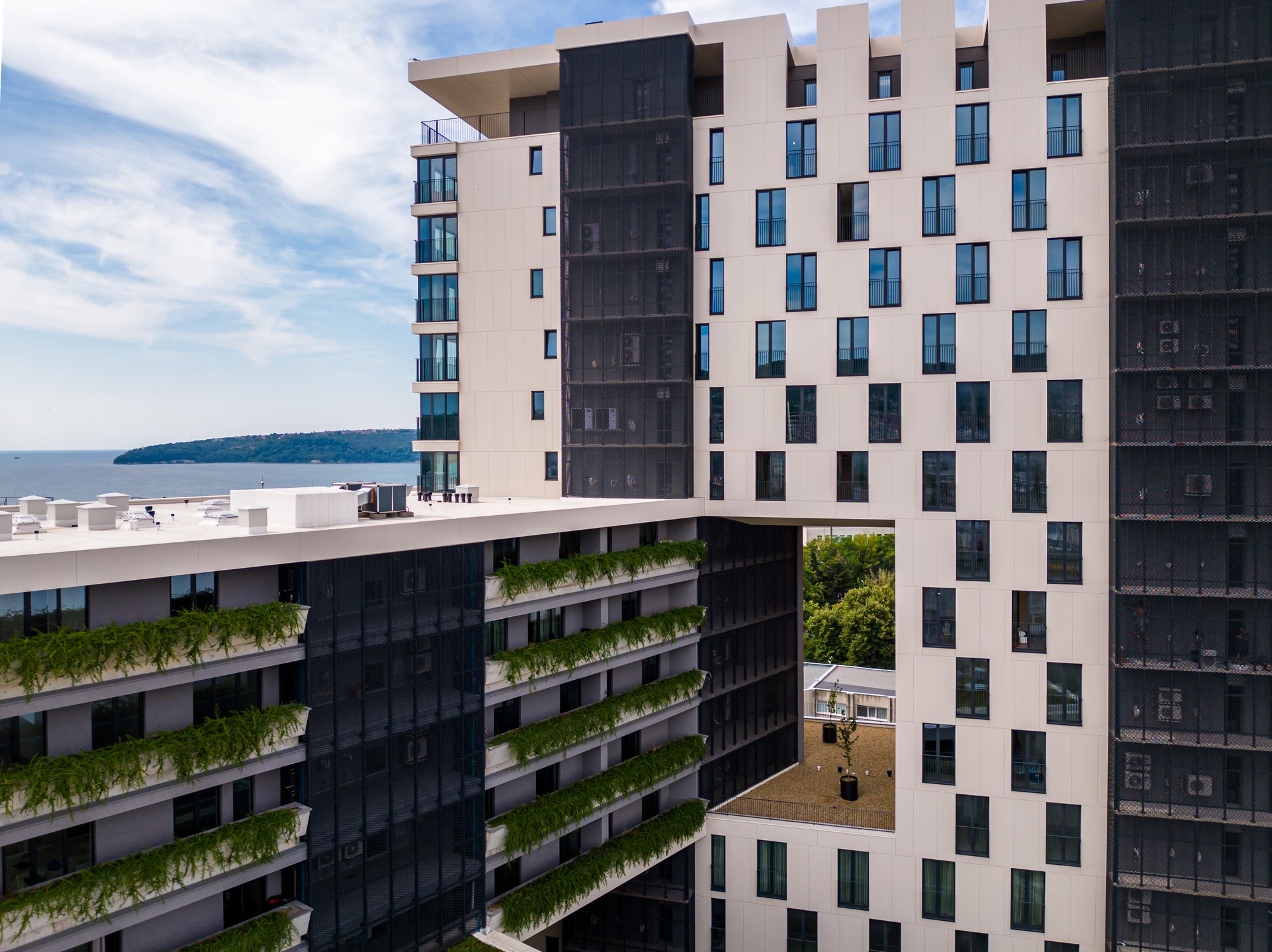 Modern office or residential building facade background. Drone flight