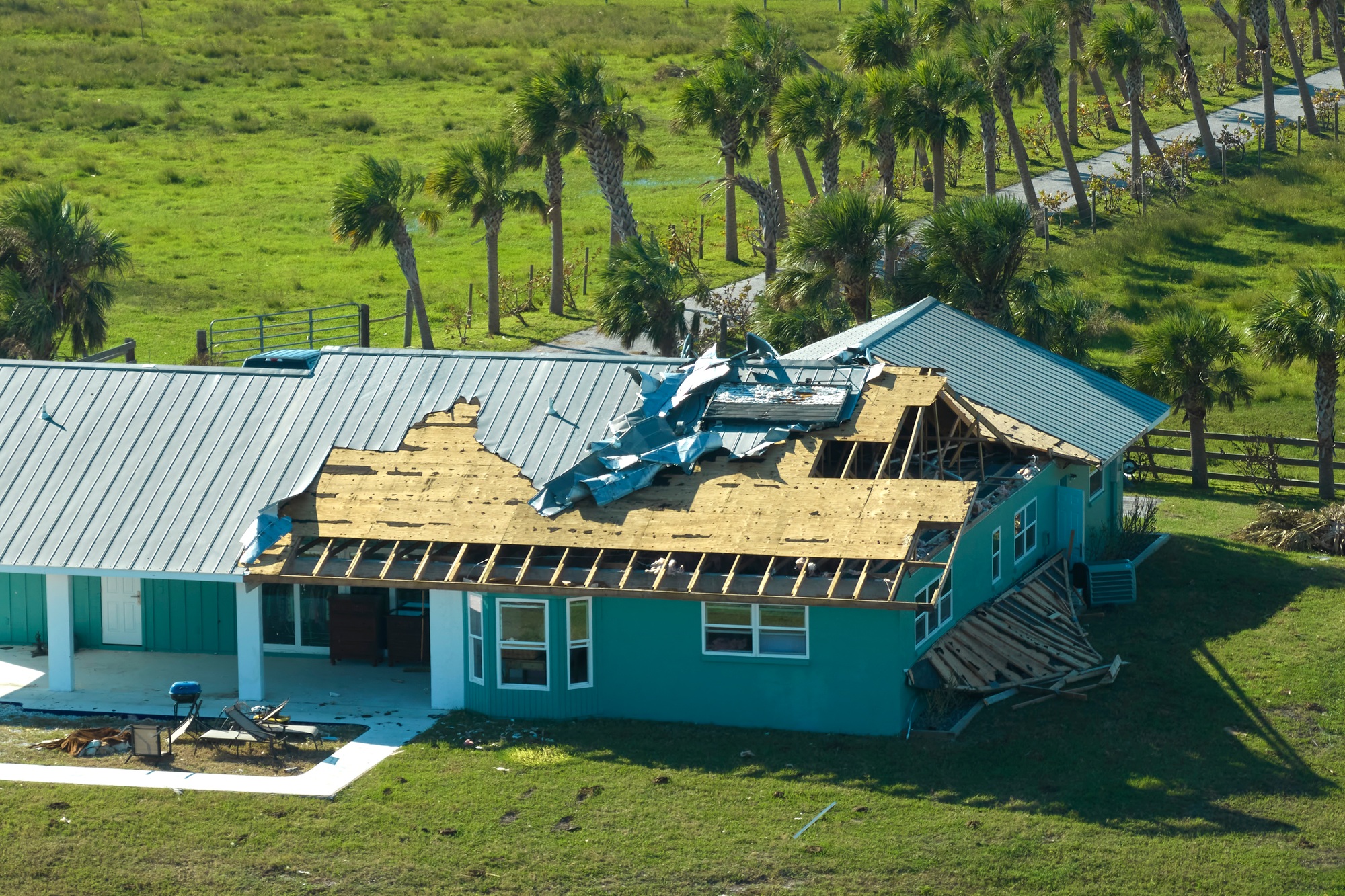 Hurricane Ian destroyed house roof in Florida residential area